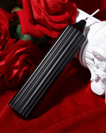 Black wax candle